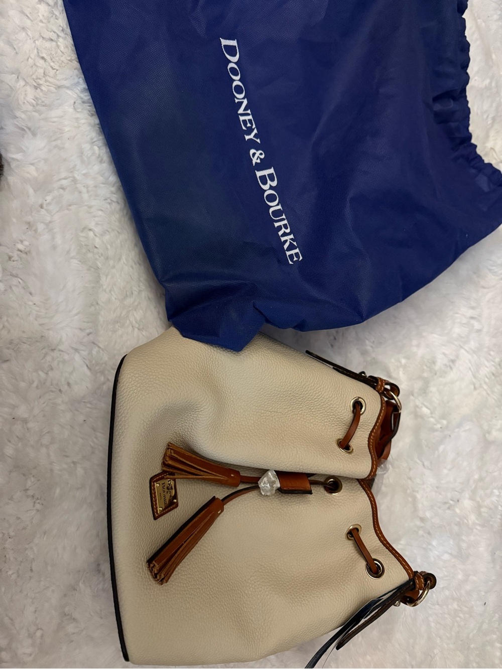Dooney & Bourke Cream Pebble Leather Bucket Bag with Tan Trim